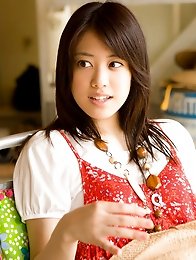 Saki Fukuda Asian in cute yellow dress tries to keep garden wet