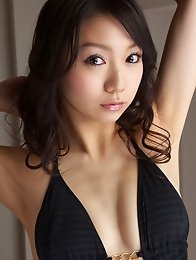 Alluring asian angel looks incredible in her fish net stockings