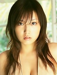 Sensual gravure idol babe seduces in skimpy cream lingerie