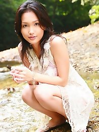 Luscious gravure idol posing with her big busty tits in a bikini