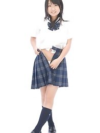 Adorable busty asian school girl lifts up her plaid skirt