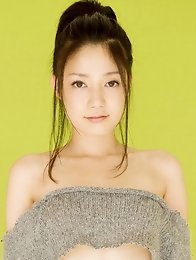 Beautiful gravure idol laying around in a skimpy red bikini