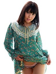 Cute and sexy Japanese girl Mai Araki with a shaved pussy and small tits undressing naked and posing