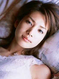 Captivating gravure idol babe Junko Yaginuma seduces in her black lingerie