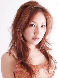 Long haired babe Remi Kawashima enchants in her pink dress