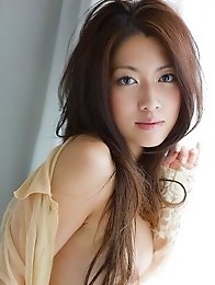 Japan girl Hikaru Takizawa undresses to show her sexy body and hairy pussy