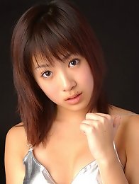 Mari Kobayashi petite Asian girl in a silver minidress
