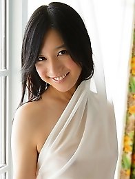 Cute and innocent Japanese av idol Iori Kogawa shows her amazing smile while being naked