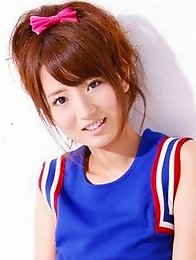 Spunky gravure idol jumping up and down as a cheerleader