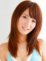 Spunky gravure idol jumping up and down as a cheerleader