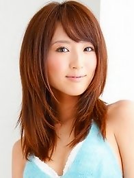 Spunky gravure idol jumping up and down as a cheerleader