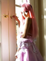 Sexy gravure idol babe naked in a cute pink wig and maid costume