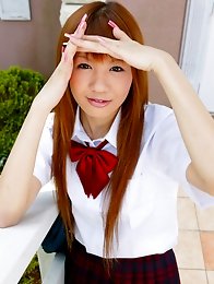 redhead japanese girl Hinano Momosaki in school uniform outdoors