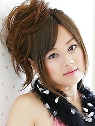 Sweet asian cutie shows off her yummy body in pink lingerie