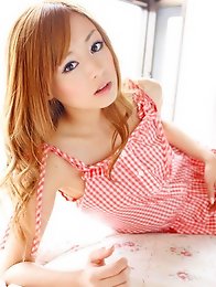 Beautiful gravure idol angel in a cute short dress and boots