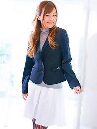 Beautiful Jun Natsukawa in a cute business suit and stockings