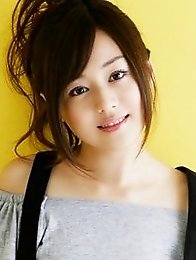 Beautiful gravure idol is adorable in cute little pink dress