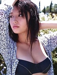 Yoko Mitsuya busty Asian posing outside in her black bikini