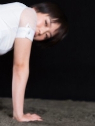 Beauty in red Ai Mukai fingers herself before using her feet to get her slave off