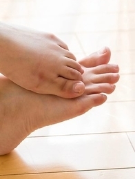 Long-legged bombshell Mio Yoshida showing her panties and hot soles
