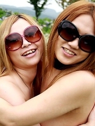 Cute Japanese babes pose outdoors