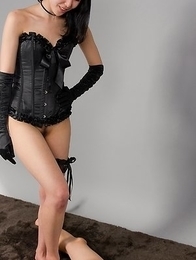 Corset-clad domme Natsuki Yokoyama uses her perfect feet to get him off