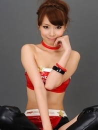 Ari Takada in long boots is really playful at photo session