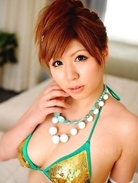 Cute Japanese babe poses outdoor