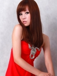 Sandy on heels shows hot behind in red dress for pictures