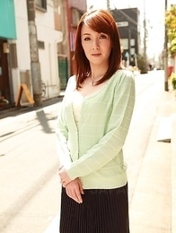 Chika Sasaki in green sweater and short skirt