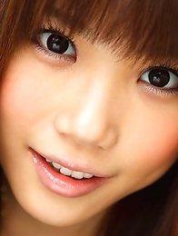 Juicy lady Honami Uehara is baring her beautiful breasts