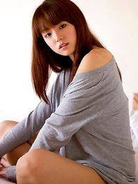 Ai Shinozaki with huge knockers plays with pillows in bed