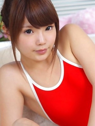 Manami Sato with sexy curves in bath suit plays with pillow