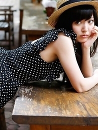 Airi Suzuki in cute bath suit enjoys hot sand on her curves