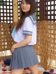 Misaki Nito in school uniform goes to classes riding bike