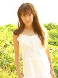 Nozomi Kawasaki in yellow bath suit enjoys the sun and sea