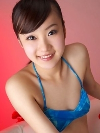 Kana Yuuki in fishnets has fine curves in blue bath suit