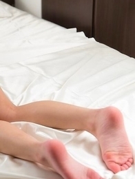 Leggy Luna Kobayashi puts on a sexy pantyhose before using her vibrator toy