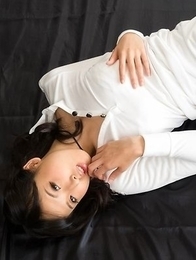 Hottie in white Natsuki Yokoyama teasing that cock with her feet and hands
